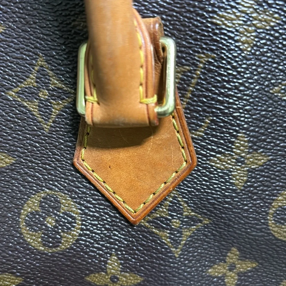 Louis Vuitton tote, rolled handles. Open top. - Picture 14 of 15